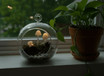 Hanging glass plant terrarium with glow-in-the-dark mushrooms