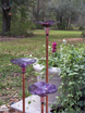 3 Purple hand-blown glass butterfly feeders