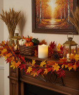 LED Flameless candle on mantle with fall decor