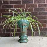 Grecian Head Planter in Florentine finish planted