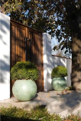 Artemis fiberstone sphere planters in green