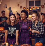Young women wearing Halloween Headbands and having fun at a party