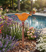 Blown Glass Butterfly Feeder Tangerine near poolside
