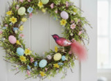 Colorful Bird Ornament clipped to an Easter Wreath