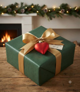 Small Matte Red Heart Ornament tied to a gift