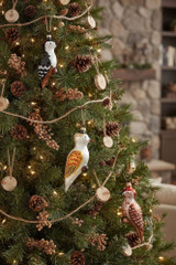 Christmas tree decorated with woodpecker ornaments