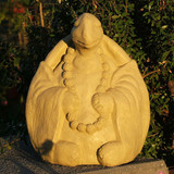 Meditating Turtle shown in old stone