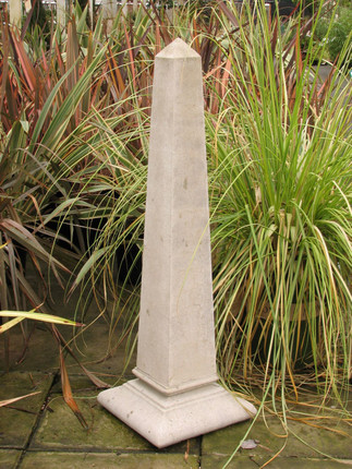 Cast stone obelisk standing 42" tall