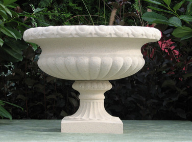 Large Tudor style cast stone planting urn