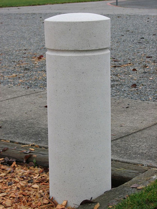 Kent cylindrical bollard crafted with cast stone offered in five finishes