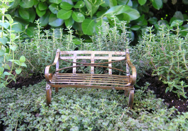 Miniature antique gardem bench
