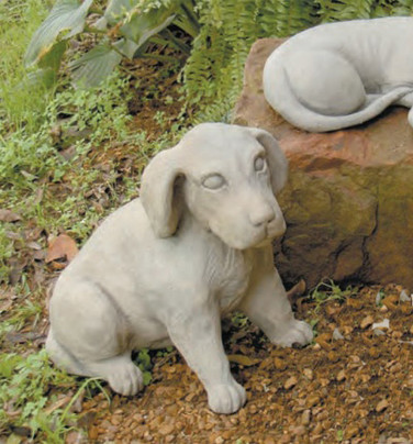 Willie the dog statue in sandstone gray