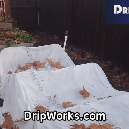 GCI Lightweight Frost Protection white row cover over raised garden beds