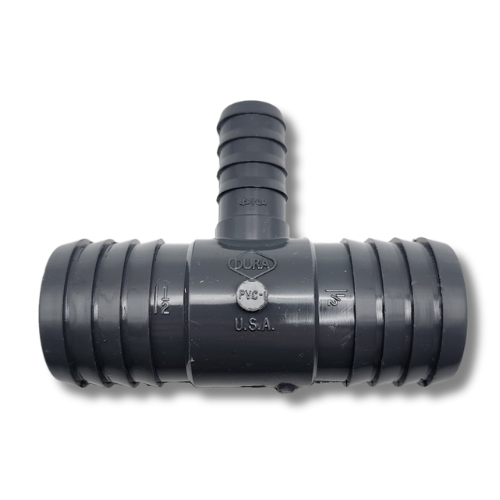 Dura Barbed Reducing Tee | PVC Pipe Fitting | DripWorks
Connect and branch your irrigation lines with confidence using the high-quality Dura Barbed Reducing Tee. Proudly made in the U.S.A., this durable PVC fitting is designed to create a secure, leak-proof connection in your drip irrigation or other watering systems. The sharp, deep barbs ensure a tight grip on polyethylene tubing, even without the use of clamps. This reducing tee allows you to easily branch off a smaller line from a larger mainline, making it a versatile component for any custom layout. Certified with NSF-PW, these fittings meet strict standards for safety and quality. Available individually or in contractor bags of 10.

Key Features:

Brand: Dura Plastic Products, Inc.

Application: Creates a secure T-joint connection between different sizes of polyethylene tubing.

Durable Construction: Made from high-grade PVC-1 for long-lasting performance and resistance to chemicals and UV degradation.

Secure Barbed Design: Features deep, sharp barbs for a reliable, leak-proof seal that holds tight.

Certified Quality: NSF-PW (Potable Water) certified, ensuring safety and quality standards.

Made in the U.S.A.: Genuine American-made quality and reliability.

Easy to Use: Simply push the tubing over the barb for a quick and secure installation.