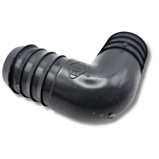 Dura 1 1/4" Barbed Elbow | 90-Degree Poly Pipe Fitting | Made in USA
Navigate sharp corners in your irrigation system with ease using the Dura 1 1/4" Barbed Elbow. This heavy-duty 90-degree fitting is expertly designed to connect two lengths of 1 1/4" polyethylene or poly pipe, ensuring a secure, leak-proof turn. As the slogan says, "When Quality Counts, Don't Compromise." This fitting, proudly made in the U.S.A. by Dura Plastic Products, features deep, sharp barbs that grip tubing tightly for a reliable connection that lasts. It's the perfect solution for sprinkler systems, drip irrigation mainlines, and other outdoor watering projects requiring a sharp change in direction.

Key Features:

Brand: Dura Plastic Products

Product: 90-Degree Barbed Elbow

Size: Fits 1 1/4" Polyethylene Pipe

Durable Construction: Made from high-quality, weather-resistant plastic for long-term performance.

Secure Connection: Features sharp, deep-set barbs for a superior grip and a leak-proof seal, often eliminating the need for clamps.

Easy Installation: Simply push the poly pipe firmly over the barbed ends for a quick and secure fit.

Made in the U.S.A.: Ensures top-tier manufacturing standards and product quality.

Application: Ideal for making tight 90-degree turns in irrigation mainlines without kinking the pipe.