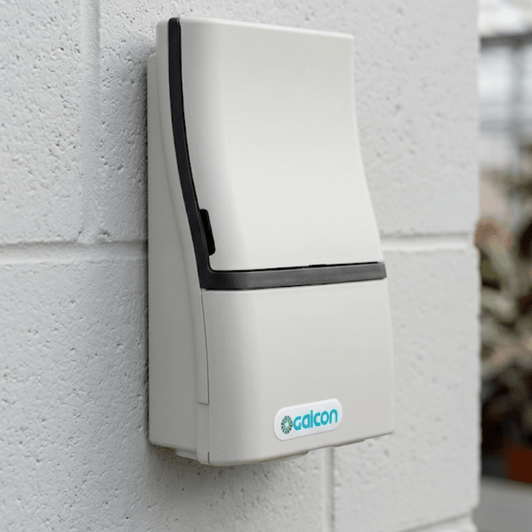 Galcon 8002 AC 2-Station Controller closed white housing mounted on a white wall MPN: GAE5S0002U1