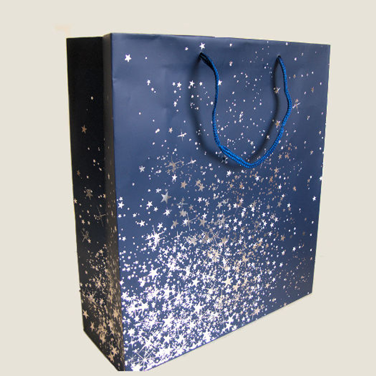 Quality paper rope handle Gift Carrier Bag blue background with siver stars