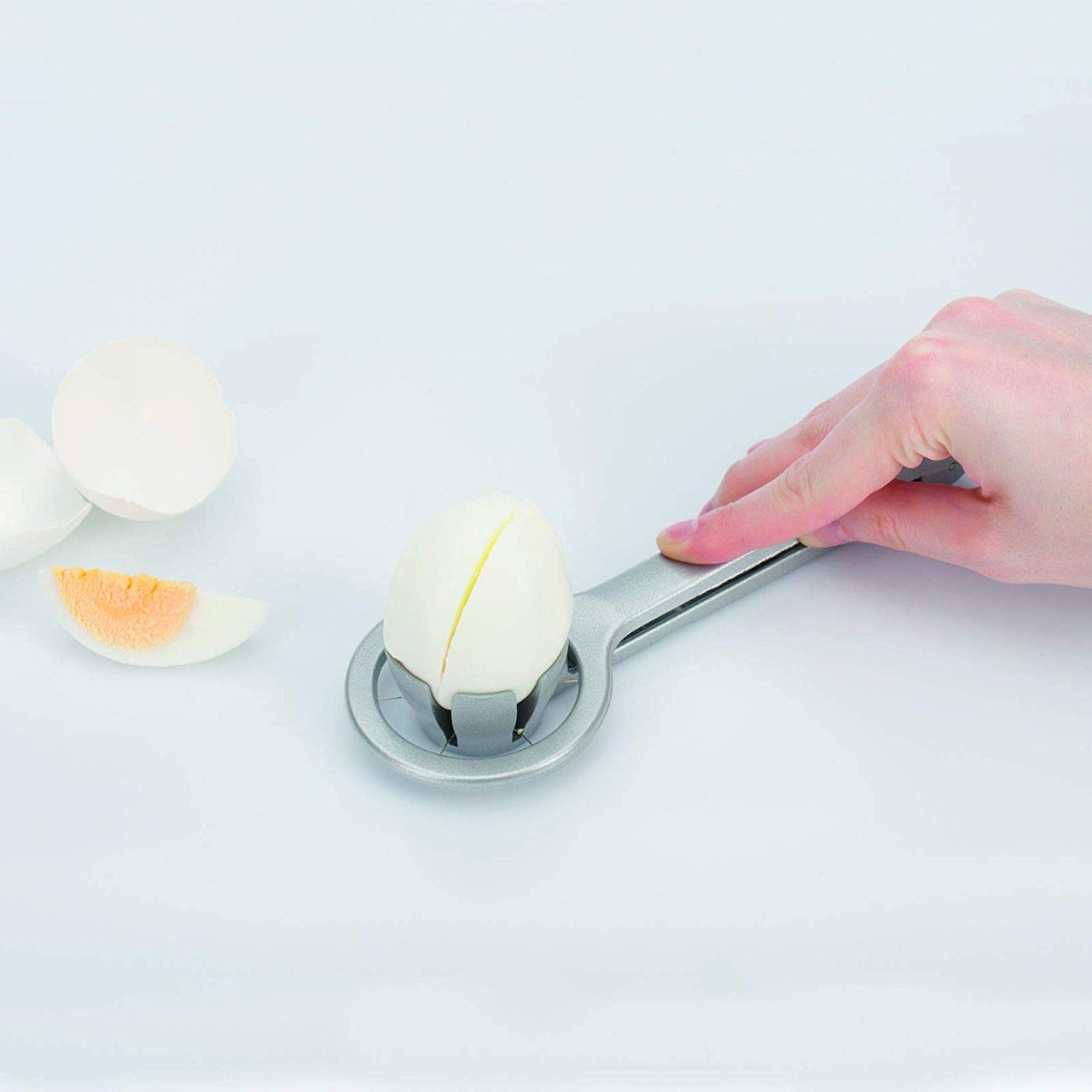 https://cdn11.bigcommerce.com/s-tjx0gy7pkp/images/stencil/1280x1280/products/15032/22002/Westmark_Columbus_Egg_Cutter_wedger_slicer_Silver_4__51640.1609412064.jpg?c=2