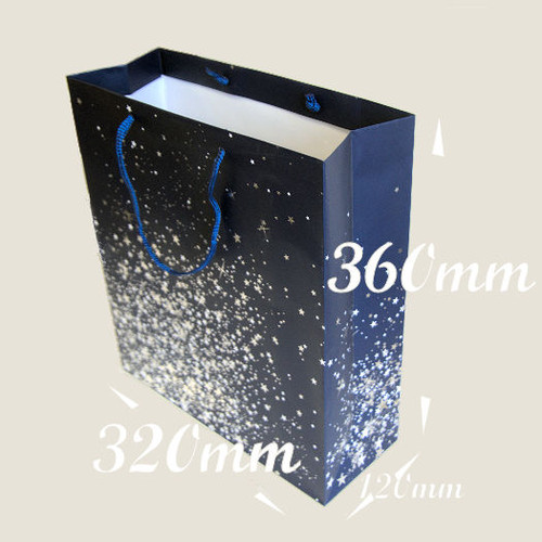 Quality paper rope handle Gift Carrier Bag blue background with siver stars