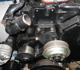 New Style Fan support bracket and water neck on a Cummins 12-Valve Engine