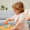 girl playing with shape shakers