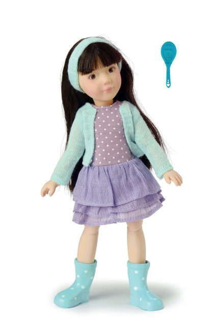 Kruselings Luna doll casual set wearing lilac skirt, cardigan and polka dot boots with hairbrush accessory