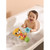Baby in bath with Vtech otter