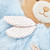 Close-up of Kaloo Perle Bear plush texture and details