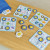 Orchard Toys Alphabet Bingo educational letter matching game for kids with colourful alphabet boards and picture cards.