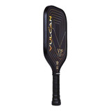 The V740 MAX Pickleball Paddle by Vulcan has a carbon-fiber face with StateraCore poly honeycomb core and an extended handle in stylish black and gold design.