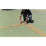 Man setting up Pickleball Court Stencil components