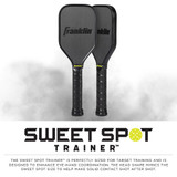 Franklin Sweet Spot Pickleball Training Paddle featuring a 15" length and 5.1" width, T700 Carbon Fiber face, and 7.3" extended handle to place the center where the sweet spot of your usual paddle would be.