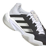 View of the white silver metallic color of the adidas Barricade 13 Court Men's Pickleball Shoe heel.