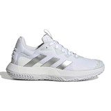 Anterior side view of the adidas SoleMatch Control Women's Shoe shown in the White Silver Metallic color option.