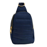 Front view of ah.dorned Eliza Quilted Puffy Sling Bag with out the strap in the color Navy.
