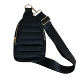 Front view of ah.dorned Eliza Quilted Puffy Sling Bag in the color Black.