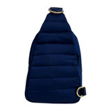 Back view of ah.dorned Eliza Quilted Puffy Sling Bag in the color Navy.