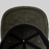 View of the Heritage Pickle-ball Circle Patch Vintage Corduroy Hat under bill in the color Olive.