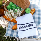 Ame & Lulu Pickleball Stitched Swift Terry Towel displayed next to a picknick basket.