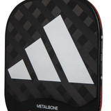 Close up view of the adidas Metalbone Pickleball Paddle's textured carbon fiber face