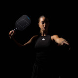 Lifestyle image of the Diadem A52 Carbon Fiber Pickleball Paddle in action