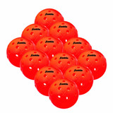 View of Pink 12-pack Franklin X-40 Performance Outdoor Pickleballs out of packaging.