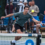 Pro Tyler Loong on the court with the Vulcan V1200 T800 Raw Carbon Fiber Pickleball Paddle