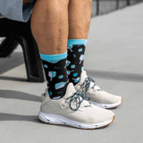 View of the Blue Born to Rally Born to Rally Bamboo Pickleball Socks on model.