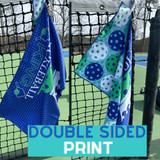 Infographic showing the Born to Rally Pickleball King Double-Sided Microfiber Towel displayed on pickleball net. Text "Double Sided Print"