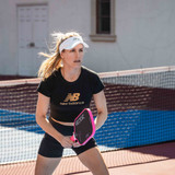 Pickleball pro Genie Bouchard playing with the VERSIX Vector XL GB Signature Pickleball Paddle