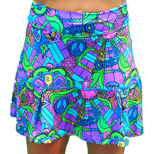 Pickleball Bella Groovy Drop Pleat Skort featuring a stretchy synthetic blend fabric construction and a bright purple, blue, and pink-colored design