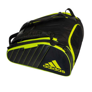 The adidas ProTour Racket Bag features a  black polyester body with contrasting accents along the sides with a bright yellow adidas logo. Adjustable shoulder straps with a variety of compartments.