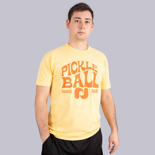 Front view of Pickleball Central's Heritage Pickle-ball Groovy Front Logo Unisex T-Shirt on a male model in the color
