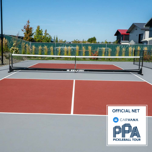 Front view of the Selkirk Semi-Permanent Pro Net on a pickleball court